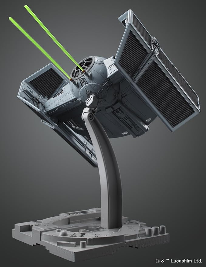 1/72 scale model of the Star Wars TIE Advanced, featuring detailed design and green laser effects on a display stand.