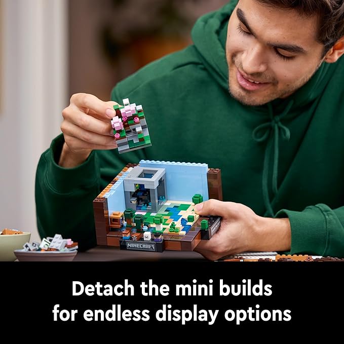 A person assembling LEGO Minecraft: The Crafting Table set, showcasing detachable mini builds for versatile display options.