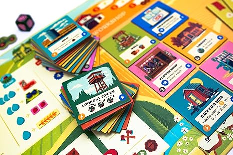Colorful game board of Harvest featuring resource cards, buildings, and a dice, showcasing gameplay elements.