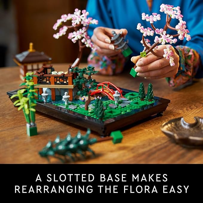 LEGO Icons Tranquil Garden set with cherry blossom trees, a pagoda, and a slotted base for easy rearrangement.