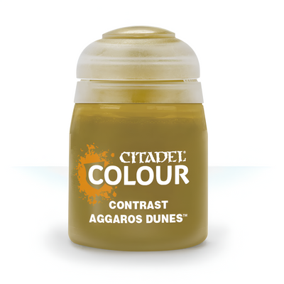 Citadel Contrast paint in Aggaros Dunes, an 18ml bottle featuring a sandy yellow hue for miniature painting.