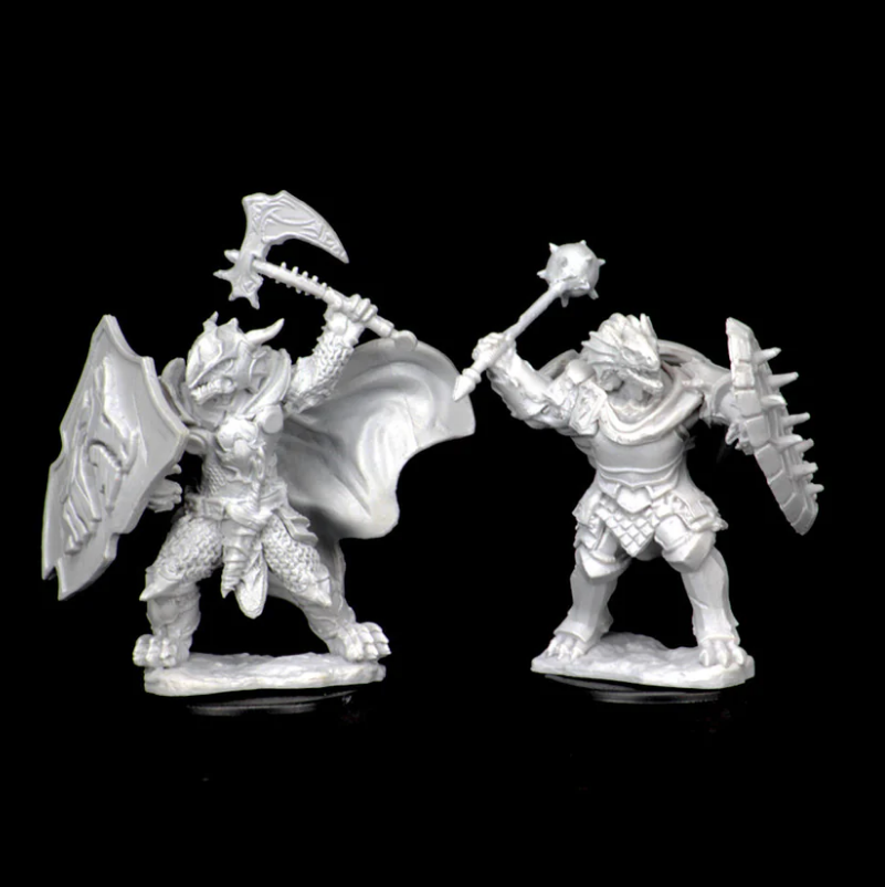 Unpainted Dragonborn male paladin miniatures for Dungeons & Dragons, featuring detailed armor and weapons.