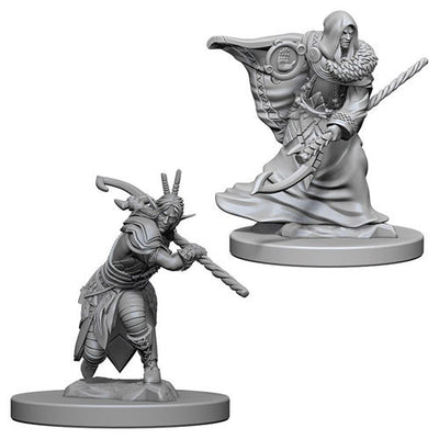Unpainted miniatures of a male elf druid in two poses, showcasing intricate details and dynamic stances for tabletop gaming.