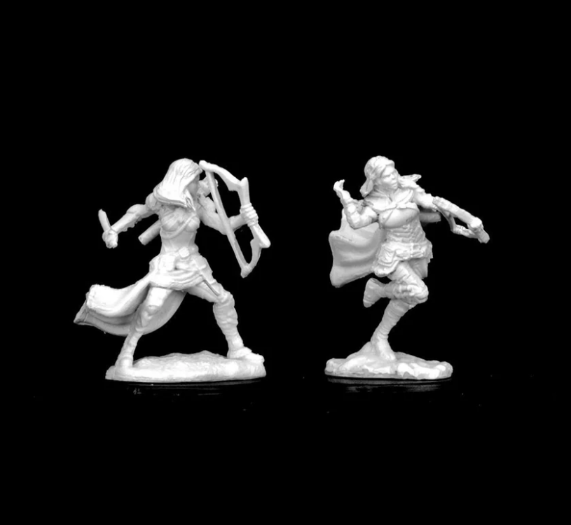 Unpainted miniatures of an Air Genasi female rogue, one wielding a bow and the other with a dagger, on a black background.