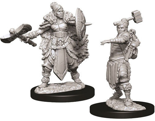 Unpainted miniatures of a female half-orc barbarian wielding a sword and shield, showcasing detailed armor and fur attire.