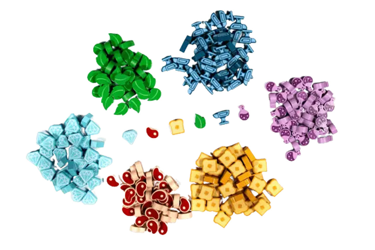 Colorful wooden resource tokens for the game Flamecraft, including leaves, gems, and various shaped pieces.