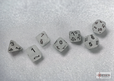 Frosted clear and black 7-die set from Chessex, featuring various polyhedral dice for tabletop gaming.