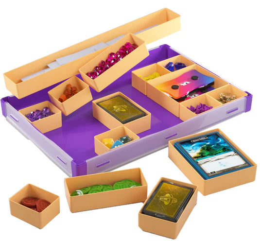 Gamegenic Token Silo XL Convertible in orange and purple, featuring organized compartments for tokens and cards.