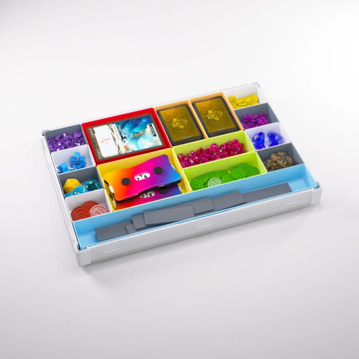 Gamegenic Token Silo XL Convertible in white and multicolor, featuring organized compartments for tokens, cards, and game pieces.