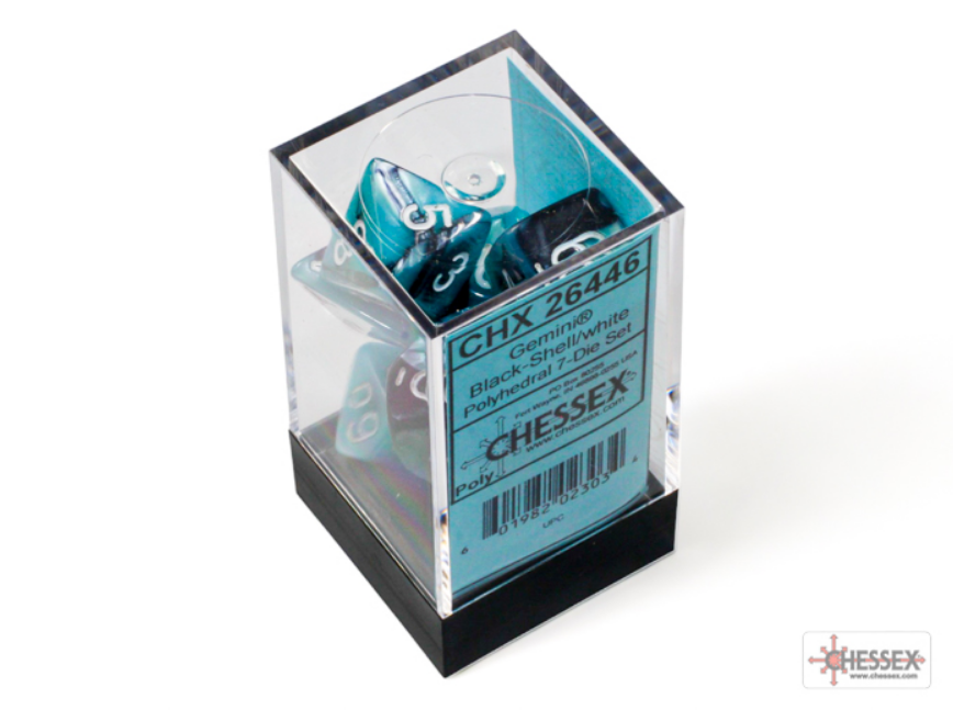 Chessex Gemini Black-Shell/White 7-die set displayed in a clear plastic box with a labeled base.
