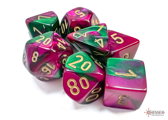 Chessex Gemini Green-Purple/Gold 7-die set featuring vibrant green and purple colors with gold numbering.