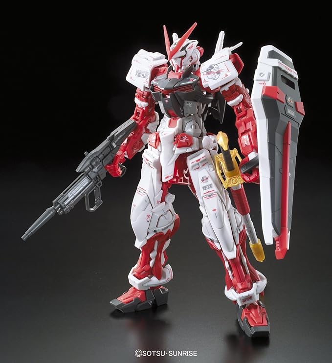 Detailed image of the Gundam Astray Red Frame RG 1/144 model kit, showcasing its red and white armor, weaponry, and shield.