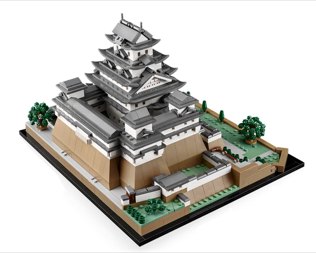 Detailed LEGO model of Himeji Castle featuring intricate architectural elements and surrounding greenery.