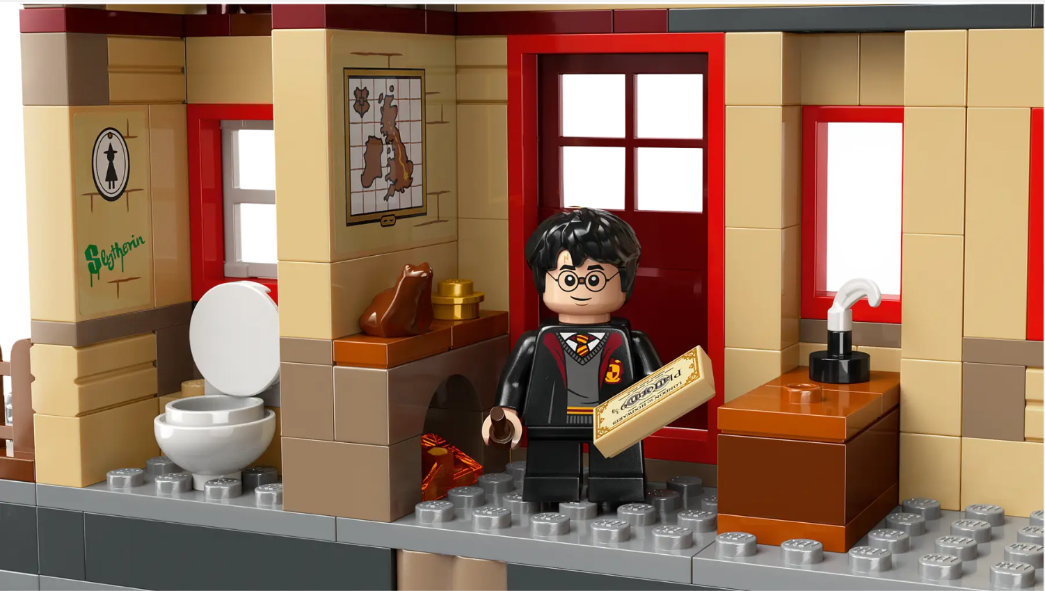 LEGO Harry Potter set featuring Hogwarts Express and Hogsmeade Station with Harry Potter minifigure and detailed interior.