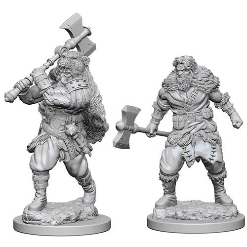 Unpainted miniatures of a human male barbarian wielding a large axe, showcasing detailed features and dynamic poses.