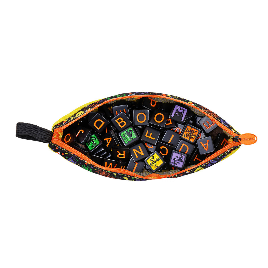 Bananagrams Halloween Party game pouch filled with colorful letter tiles in festive Halloween designs.