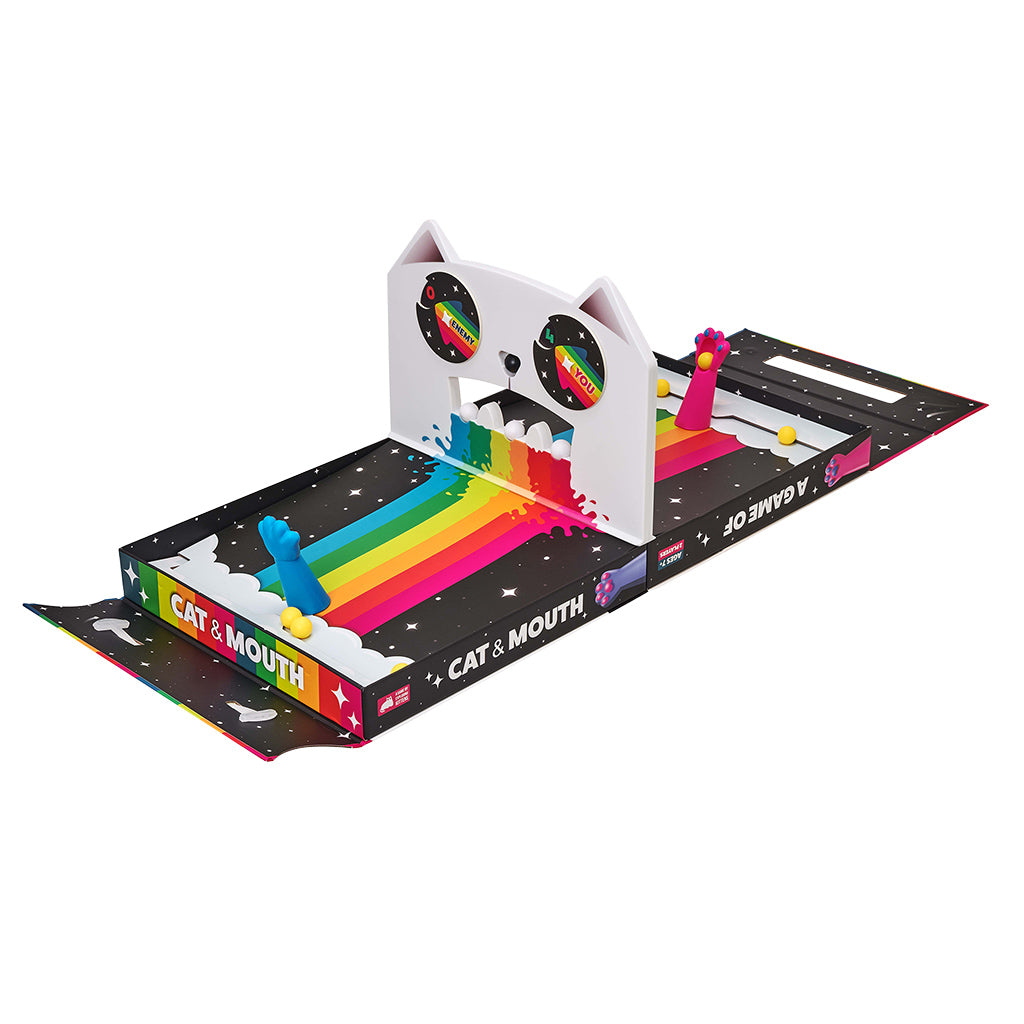 Colorful tabletop game featuring a cat-shaped design with two spinning targets and a rainbow ball pathway.