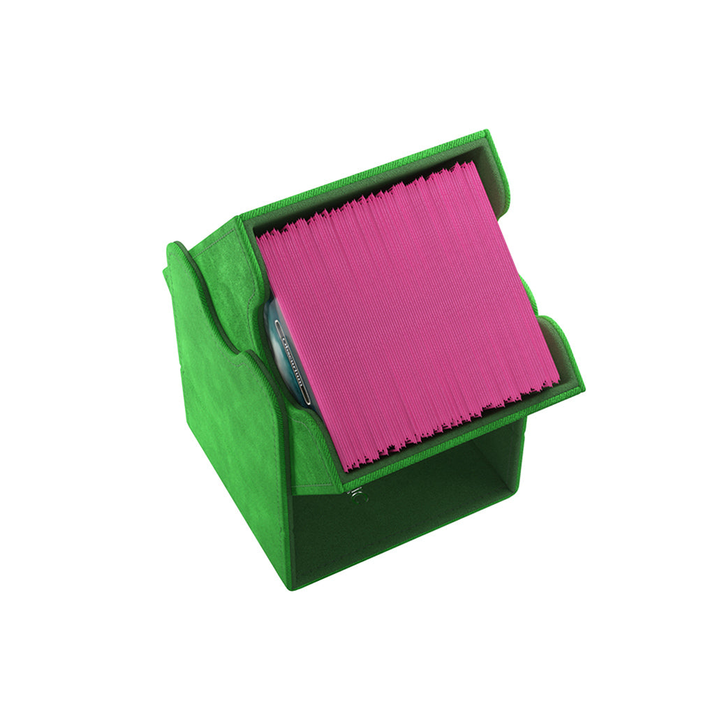 Gamegenic Deck Box Squire 100+ XL in green, holding pink card sleeves, designed for card game storage and organization.