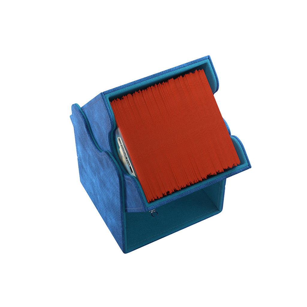 Gamegenic Deck Box Squire 100+ XL in blue, holding a stack of red card sleeves, designed for card game storage.
