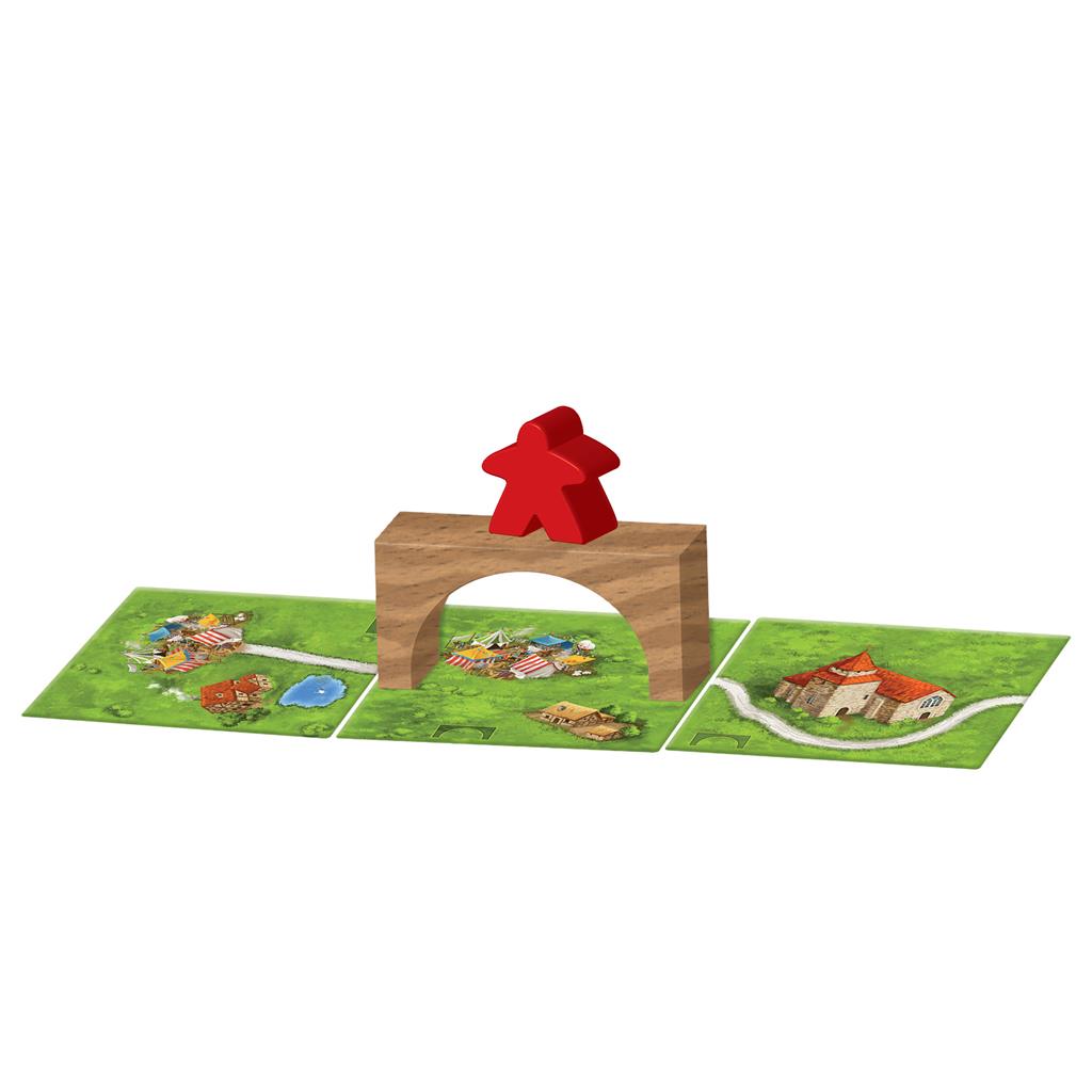 Carcassonne Expansion 8 featuring game tiles with landscapes, a wooden bridge, and red meeples on display.