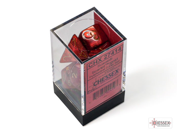 Chessex Scarab Scarlet/Gold Polyhedral 7-Dice Set in a clear display box, featuring vibrant red dice with gold markings.