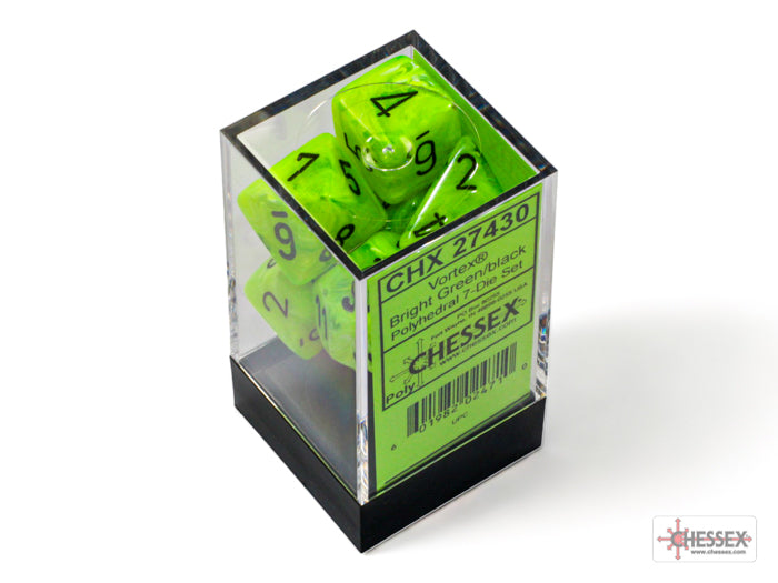 Bright green and black polyhedral 7-dice set by Chessex displayed in a clear box with a label. Ideal for tabletop gaming.