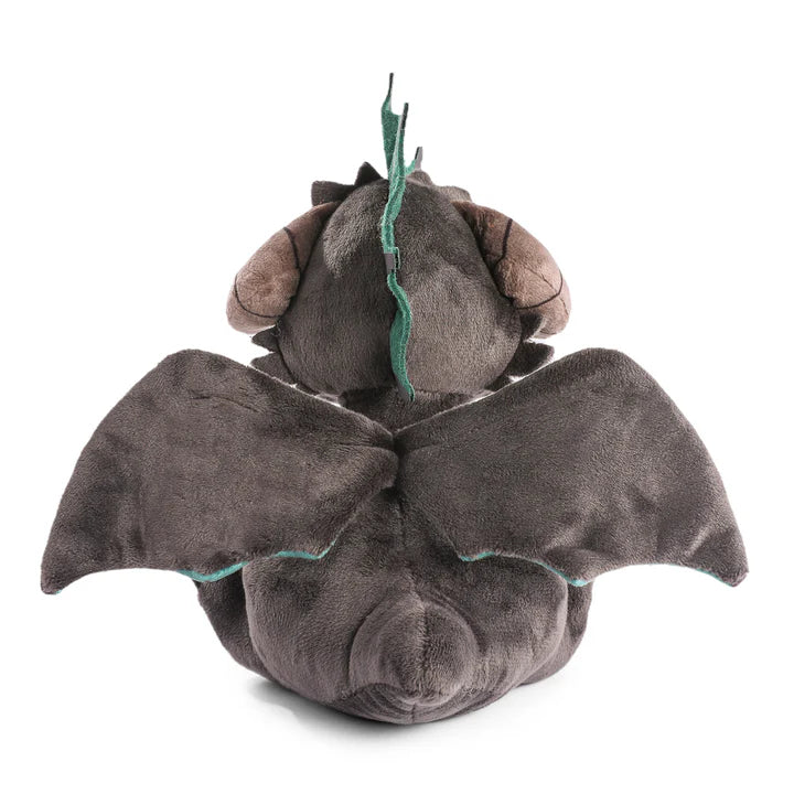 Back view of a plush black dragon with green accents and small wings, designed for Dungeons & Dragons fans by Kidrobot.