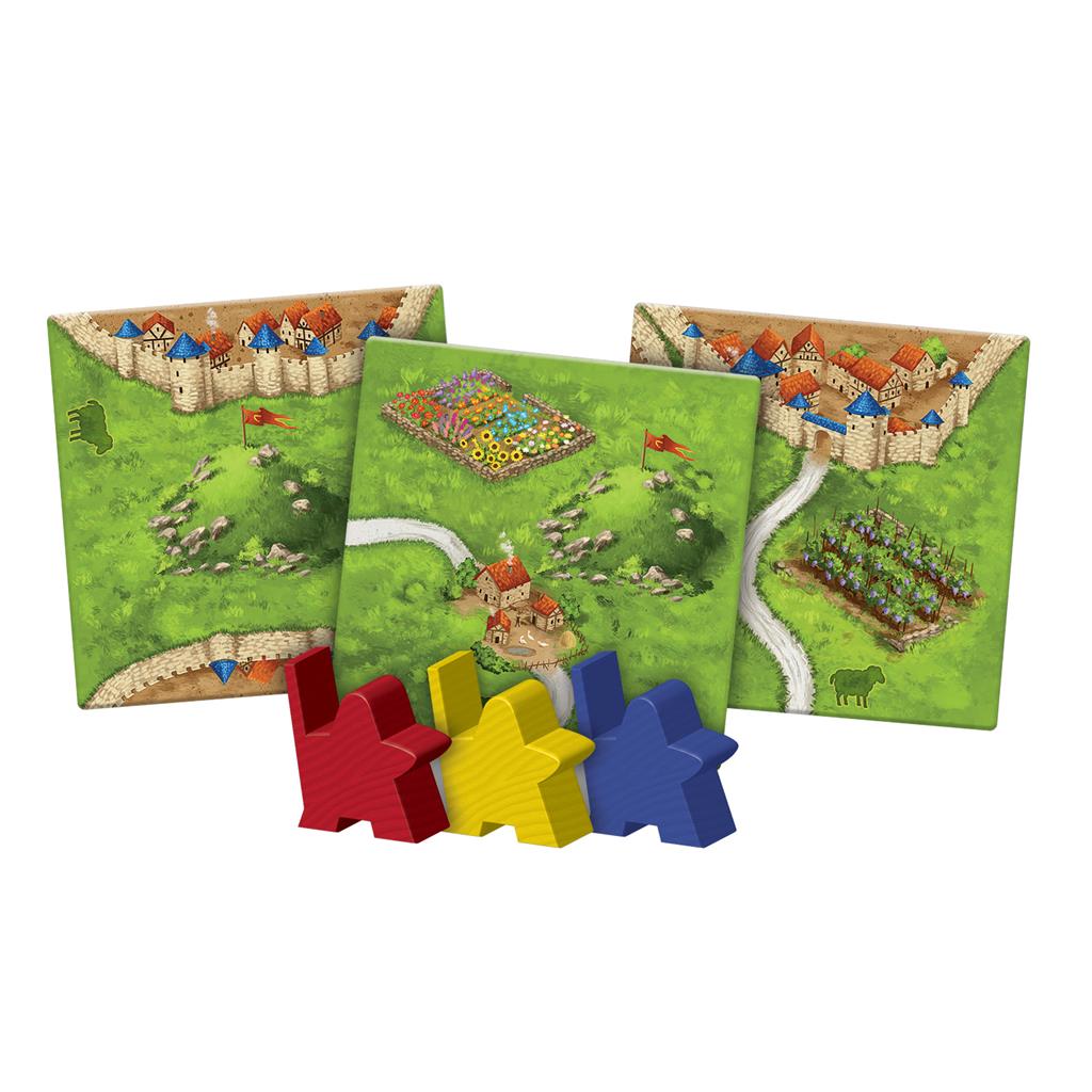 Three game tiles from Carcassonne Expansion 9: Hills and Sheep, featuring landscapes and colorful meeples in red, yellow, and blue.