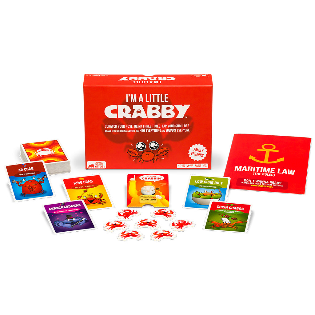 I'm a Little Crabby game box with cards and tokens, featuring colorful crab illustrations and family-friendly gameplay elements.