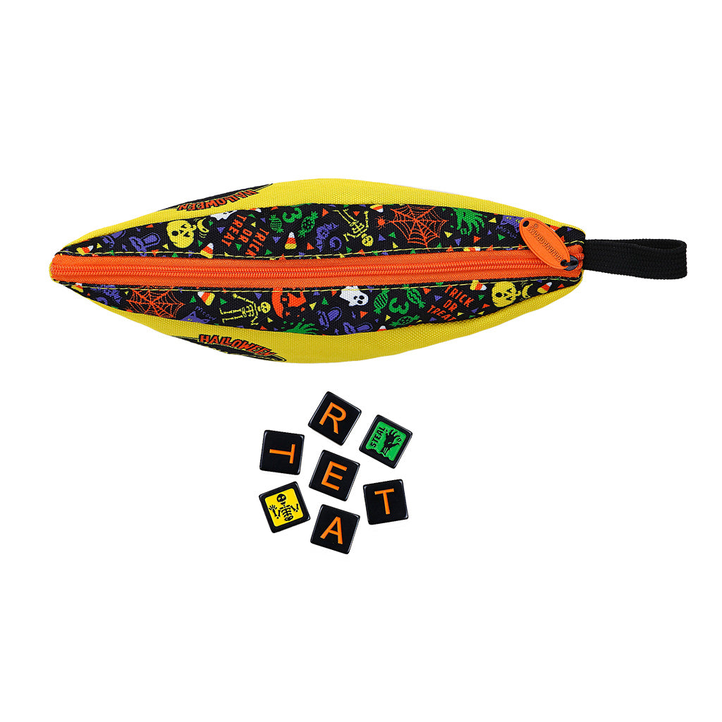 Bananagrams Halloween Party pouch with colorful spooky designs and black letter tiles scattered nearby.