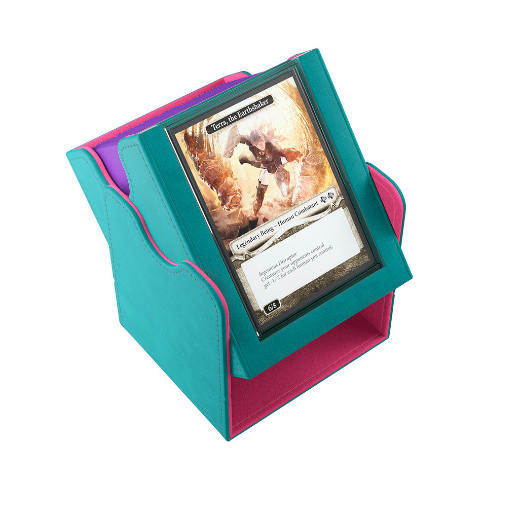 Gamegenic Deck Box Squire 100+ XL Convertible in teal and pink, holding a card with artwork of a fantasy character.