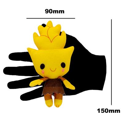 Catan Sprite Plushie in wheat design, featuring a cheerful yellow character with a brown outfit, held in a hand for size reference.