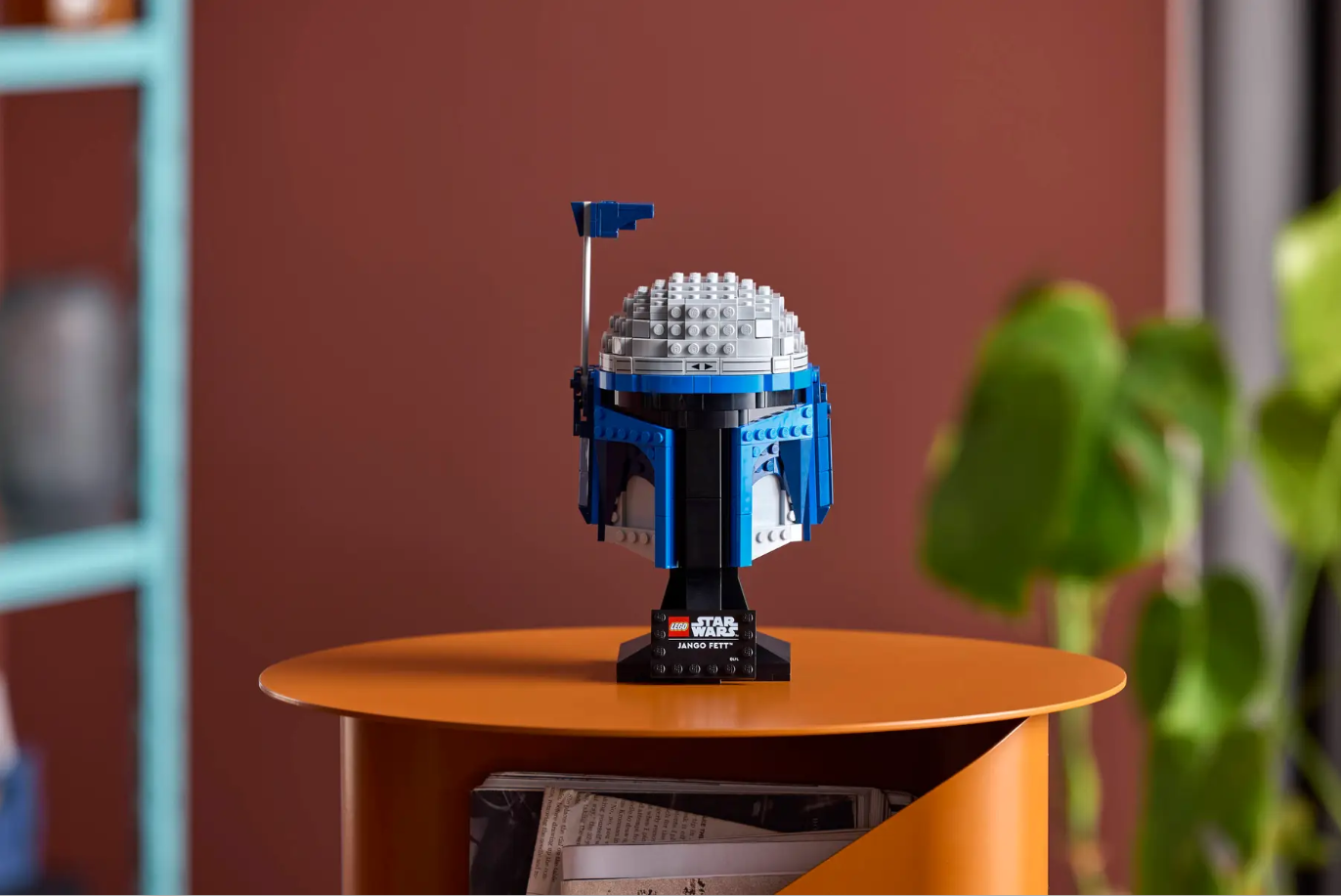 LEGO Star Wars Jango Fett Helmet set displayed on a table, showcasing detailed blue and gray design elements.