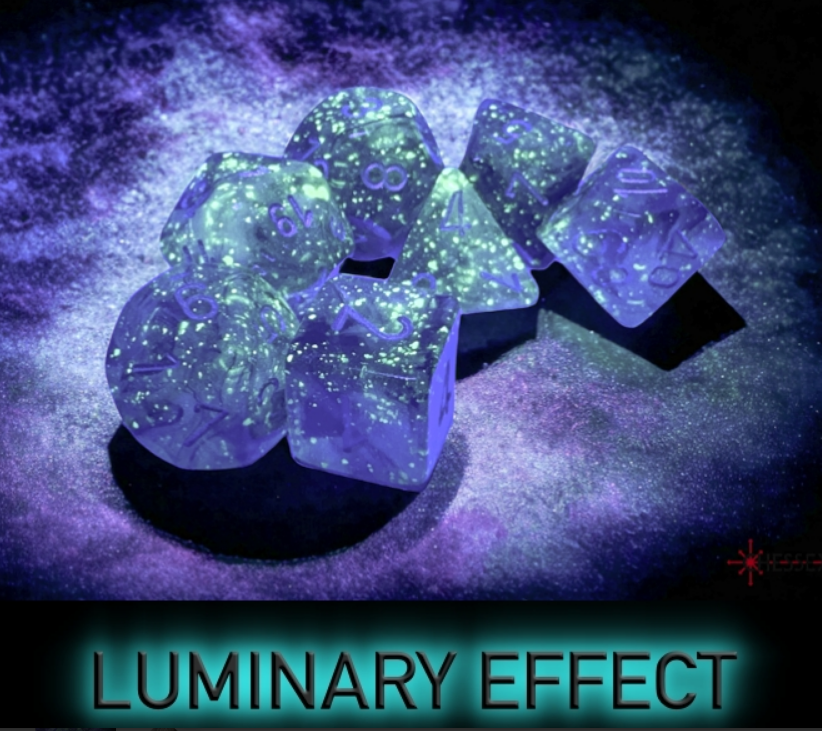 Chessex Borealis polyhedral die set in light smoke and silver, featuring a luminary effect with glowing speckles.