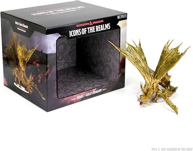 Premium Adult Gold Dragon figure from Dungeons & Dragons Icons of the Realms, displayed beside its decorative box.