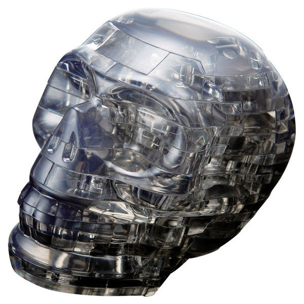 3D crystal puzzle of a black skull, featuring transparent pieces that create a detailed, lifelike design.