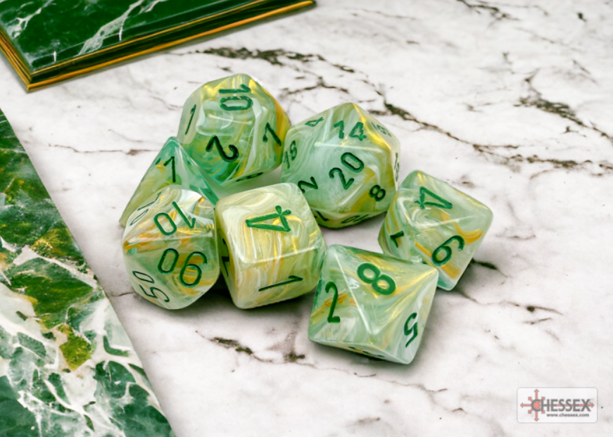 Marble green and dark green 7 die set from Chessex, featuring a mix of polyhedral dice with clear numbers.