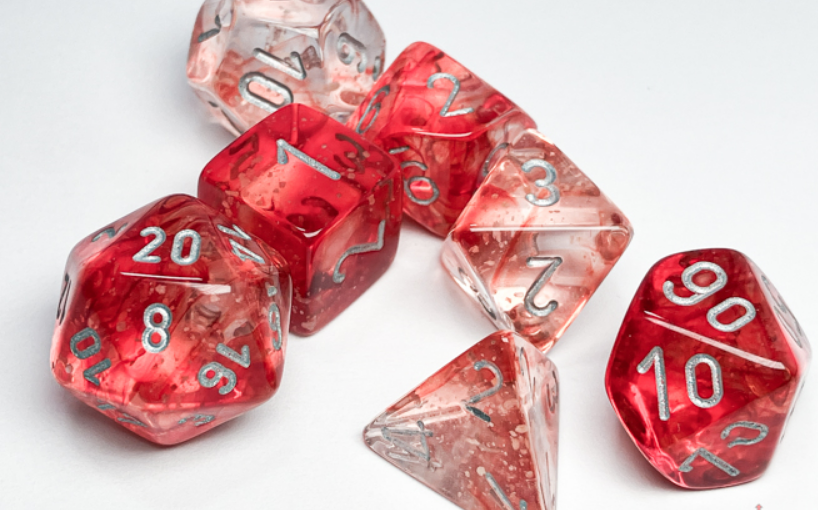 Chessex Nebula Red Silver Luminary 7 Die Set featuring translucent red dice with silver numbers, ideal for tabletop gaming.