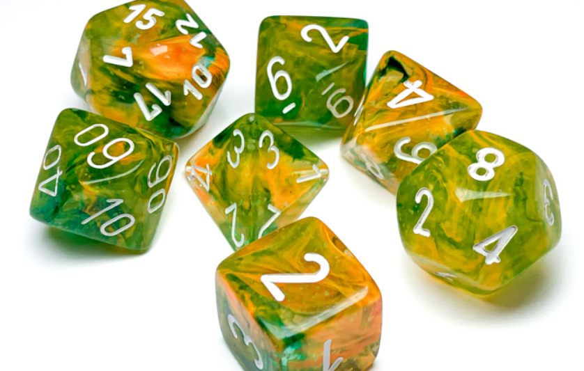 Chessex Nebula Spring White Luminary 7 Die Set featuring vibrant green and orange marbled dice with white numbers.