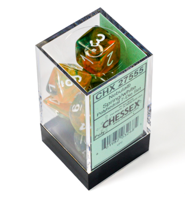 Chessex Nebula Spring White Luminary 7 Die Set in a clear display box, featuring vibrant orange and green swirls.