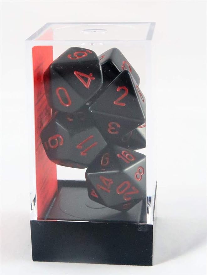 Chessex opaque black and red 7-die set displayed in a clear plastic case, featuring sharp red numbering on black dice.