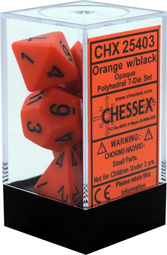 Opaque orange and black 7-die set by Chessex, displayed in a clear plastic case with warning label. Ideal for tabletop gaming.