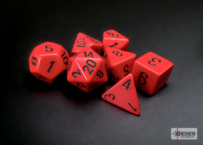Chessex opaque red and black 7-die set featuring various polyhedral dice for tabletop gaming.