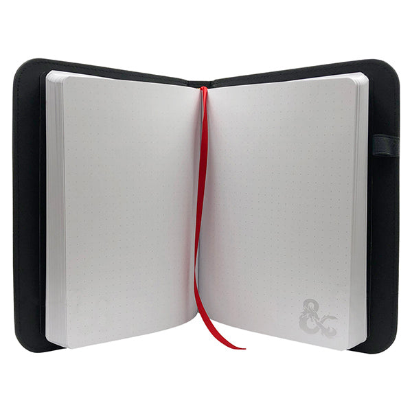 Open D&D Premium Campaign Journal featuring blank dotted pages and a red ribbon bookmark, ideal for campaign planning.