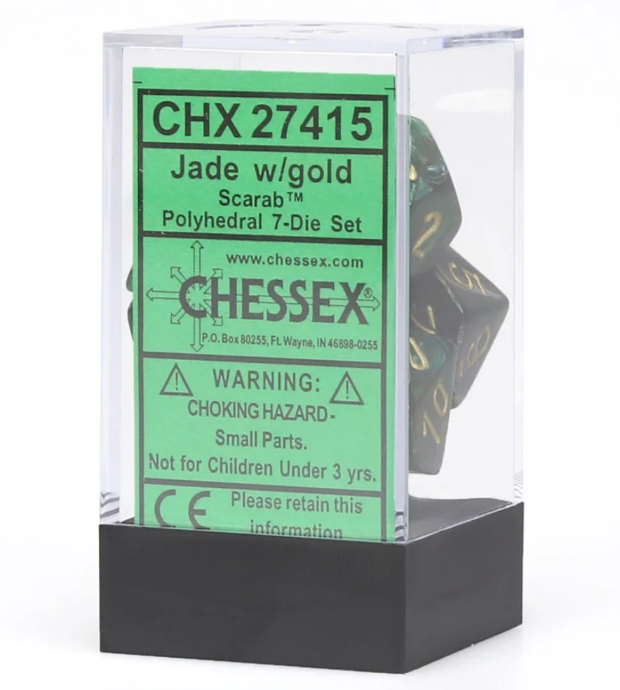 Chessex Scarab Jade/Gold 7-Die Set displayed in a clear case, featuring green and gold polyhedral dice.