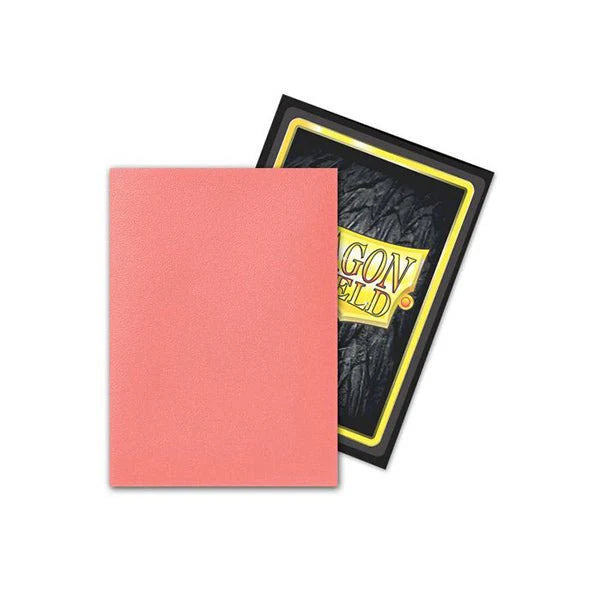 Peach matte dual card sleeves from Dragon Shield, designed to protect trading cards, featuring a sleek finish.