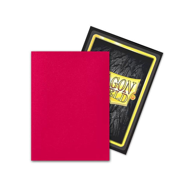 Matte red card sleeves for standard size cards, featuring a textured black backing with a yellow Dragon Shield logo.