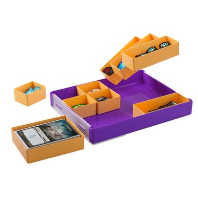 Gamegenic Token Silo Convertible in purple and orange, featuring multiple compartments for organizing tokens and cards.