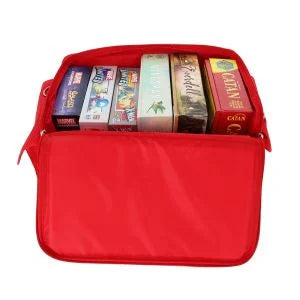Red BCW Supplies Spectrum board game bag with several board games neatly stored inside. Ideal for game enthusiasts.