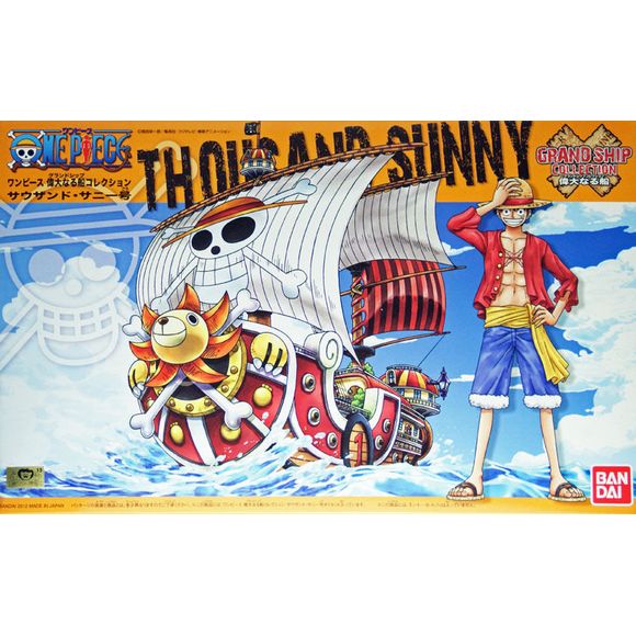 Model kit of the Thousand Sunny ship from One Piece, featuring vibrant artwork and detailed design elements.